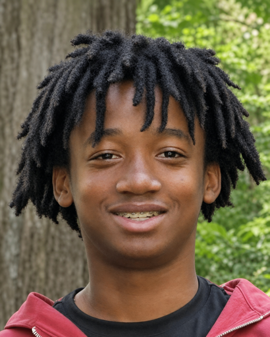 Ayinde Forrester smiling at the camera